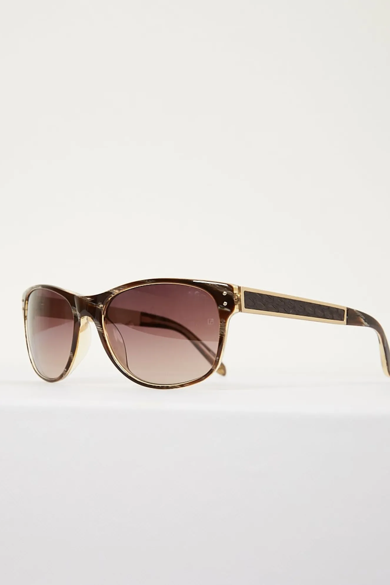 linda_farrow_gold_brown_g_1.webp Linda Farrow gold brown grad lens
