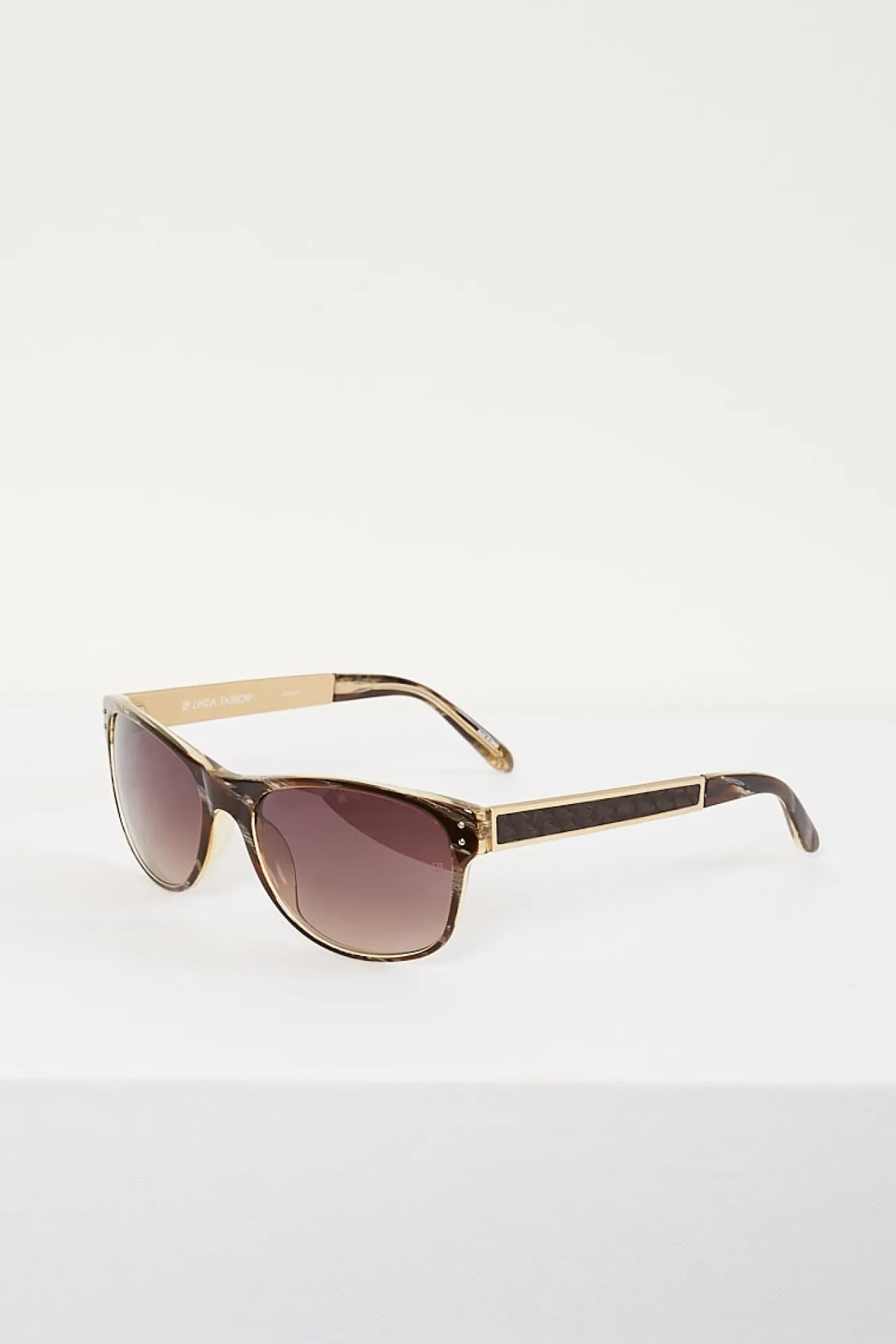 linda_farrow_gold_brown_g_2.webp Linda Farrow gold brown grad lens
