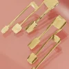 Tweek Croon tritant brass earrings